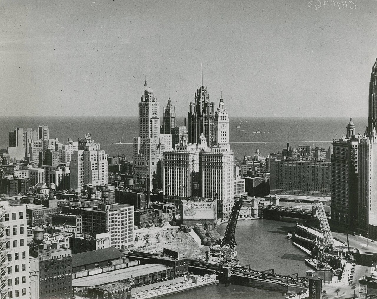 Black-and-white Chicago skyline along the river in the 1930s