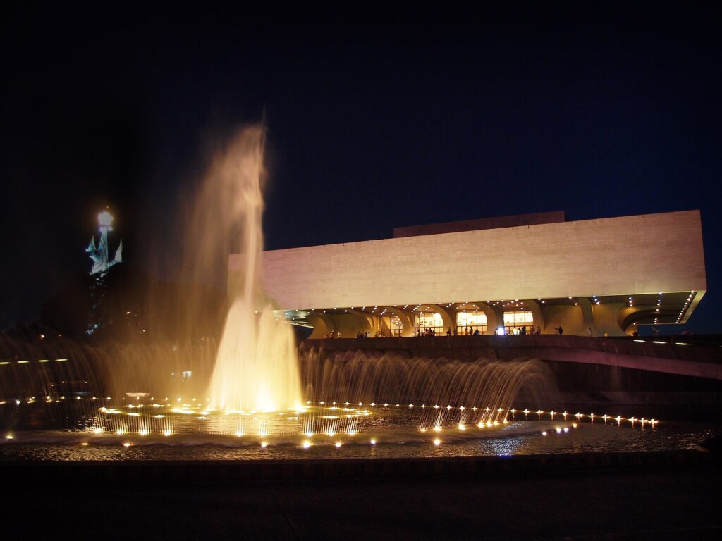 The Tanghalang Pambansa building of the Cultural Center of the Philippines in Pasay, lit up in the evening