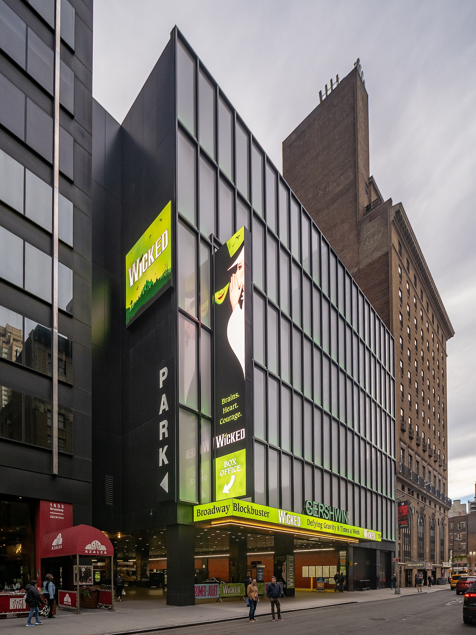 Exterior of the Gershwin Theatre on Broadway in New York City, with green Wicked signage and marquee