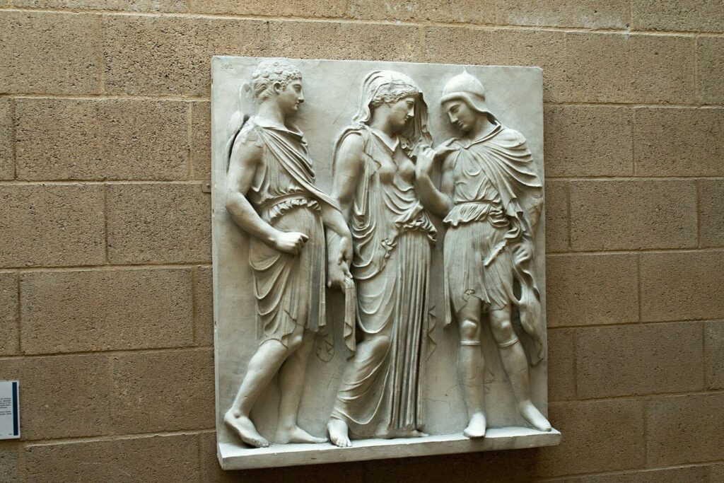 Classical relief showing Hermes, Eurydice and Orpheus, the three mythic figures at the heart of Hadestown