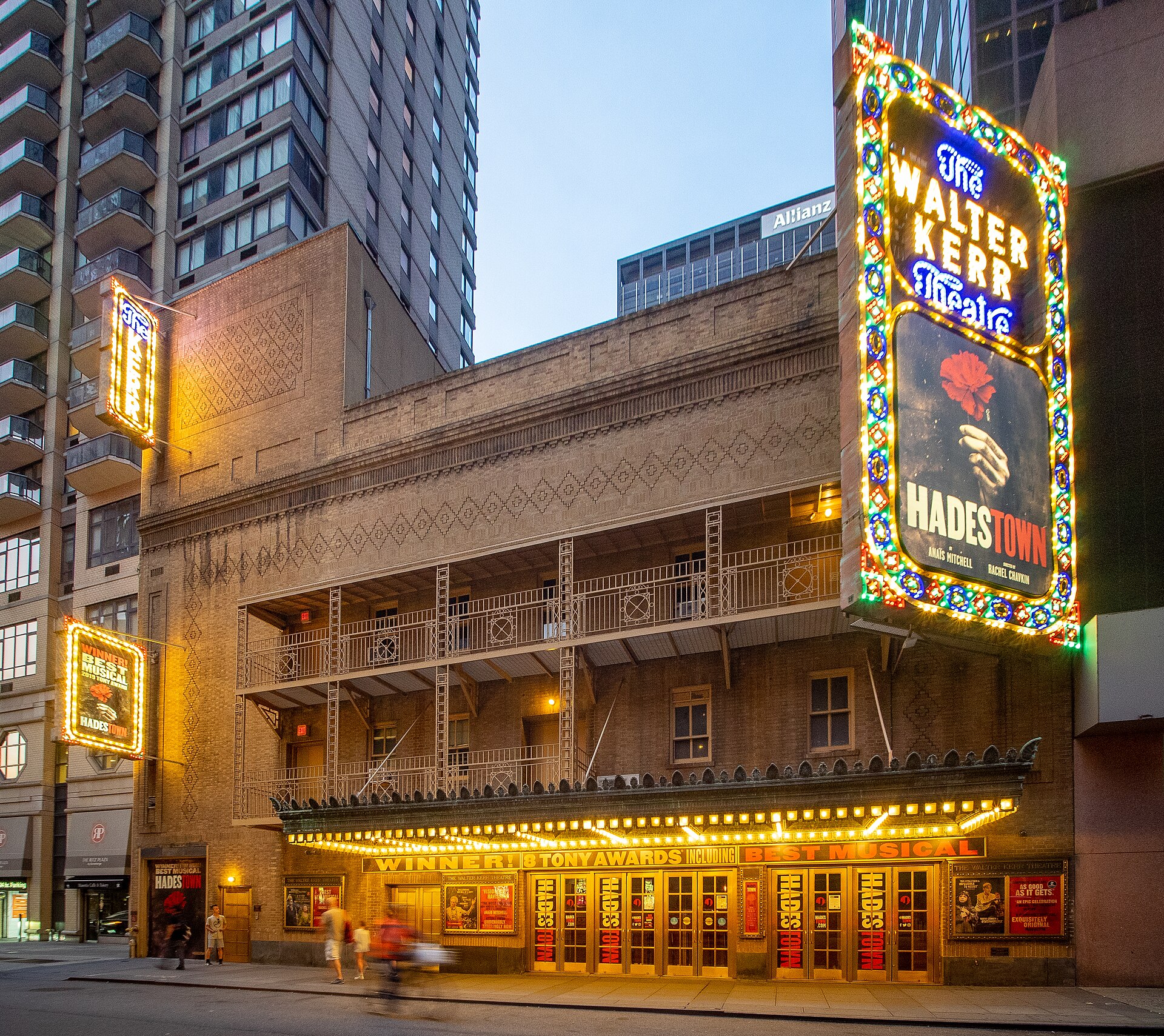 The Walter Kerr Theatre on Broadway with its illuminated Hadestown marquee at dusk
