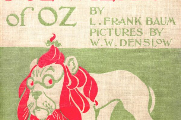 Cover of the 1900 first edition of The Wonderful Wizard of Oz with lettering and illustration by W. W. Denslow